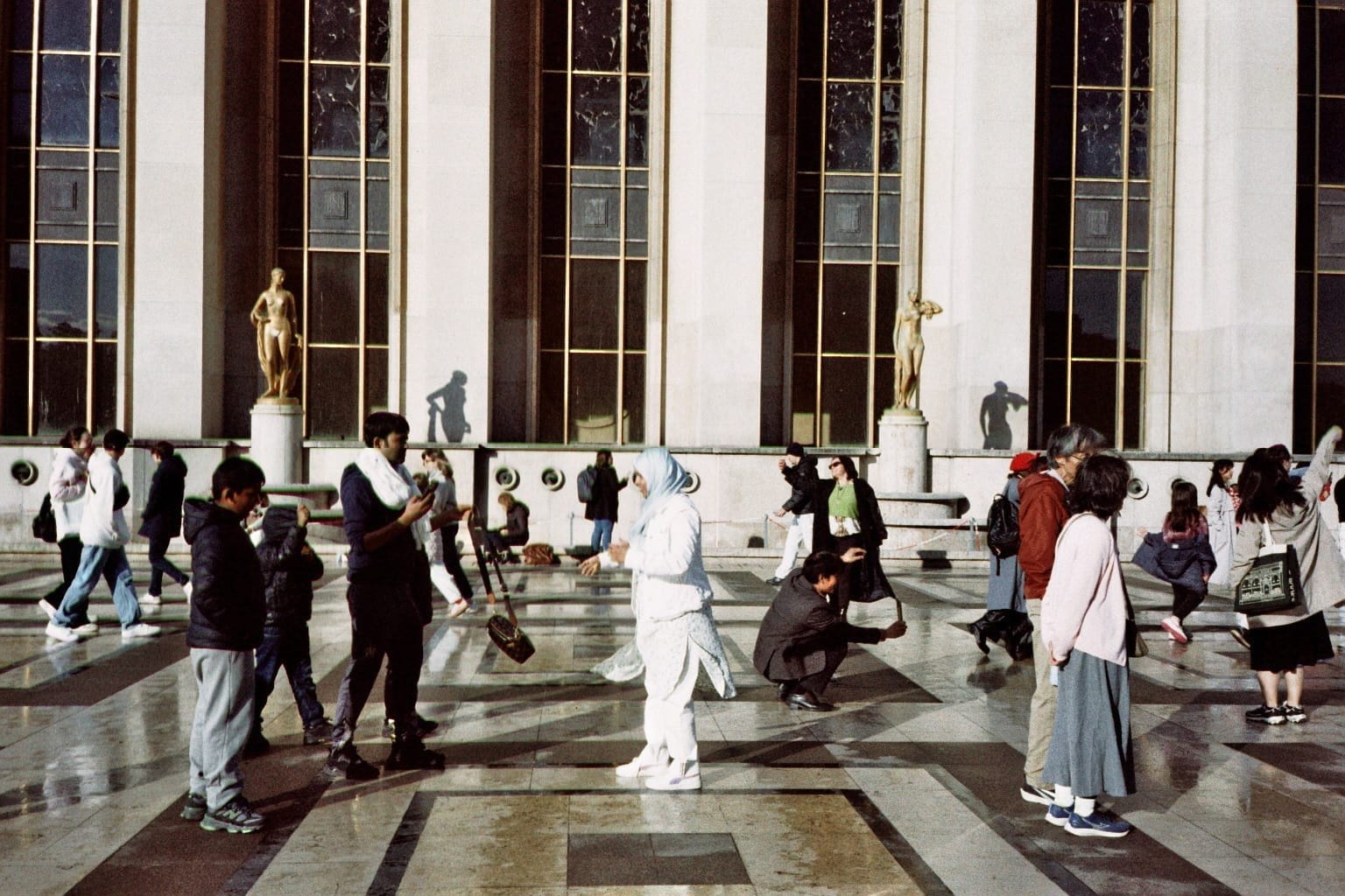 Film photo: people taking photos at the Trocadéro in Paris